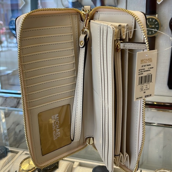 MICHAEL KORS
Leather Continental Wristlet Phone Case Wallet 
Light Cream 
NWT - Picture 10 of 16